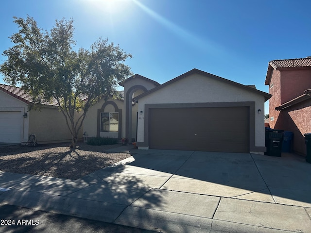 view of front of property featuring a garage