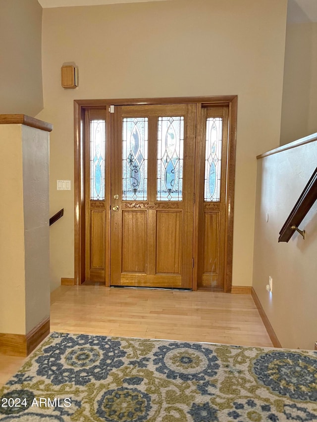 entryway with light hardwood / wood-style floors