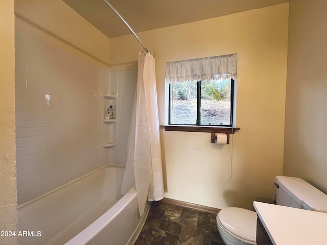 full bathroom with vanity, shower / tub combo with curtain, and toilet