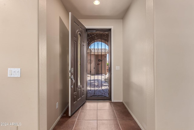 entrance foyer with tile patterned flooring