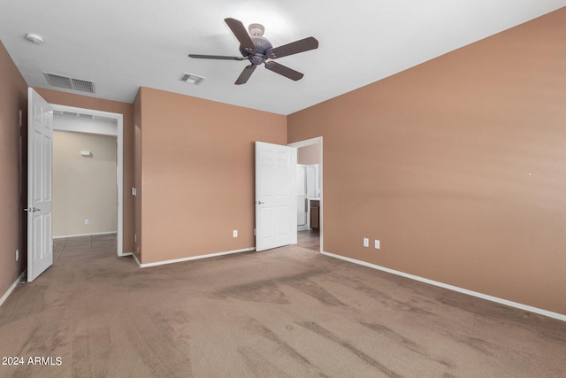 unfurnished bedroom with ceiling fan and carpet flooring