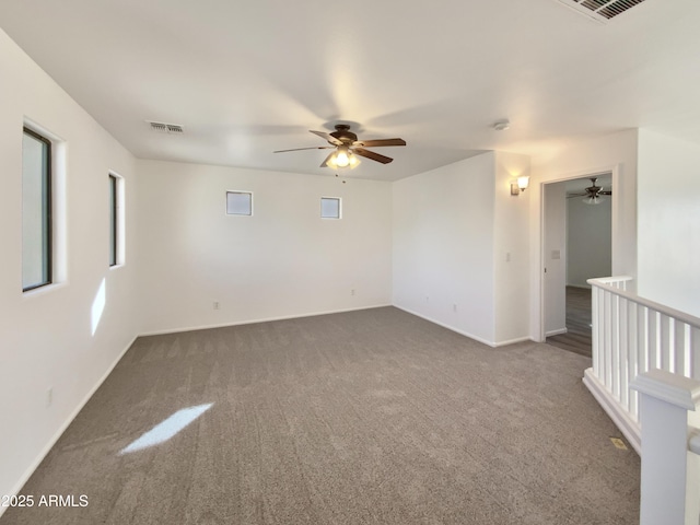 1274 W Dexter Way, San Tan Valley, AZ 85143 - carpeted empty room featuring ceiling fan, visible vents, and baseboards