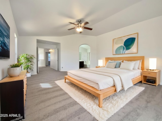 1274 W Dexter Way, San Tan Valley, AZ 85143 - carpeted bedroom featuring ensuite bathroom, baseboards, vaulted ceiling, and arched walkways