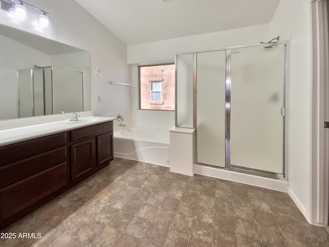 1274 W Dexter Way, San Tan Valley, AZ 85143 - bathroom featuring stone finish flooring, a stall shower, a bath, vaulted ceiling, and vanity