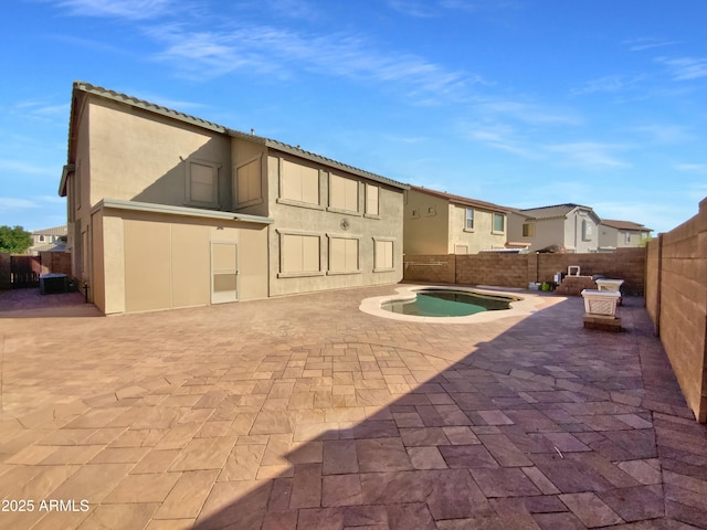 1274 W Dexter Way, San Tan Valley, AZ 85143 - back of house with stucco siding, a fenced backyard, and a patio area