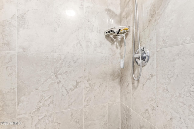 details with a tile shower