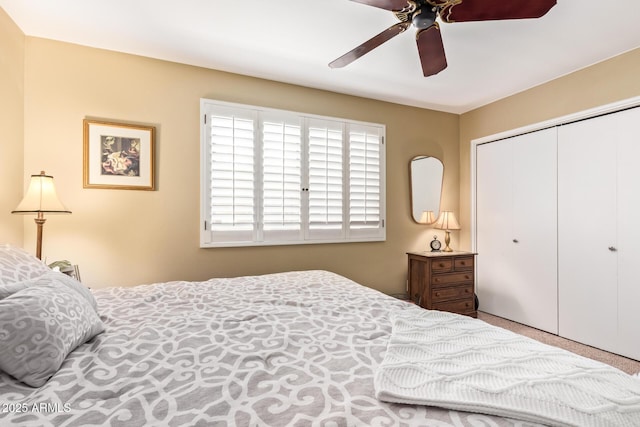 bedroom featuring a closet and a ceiling fan