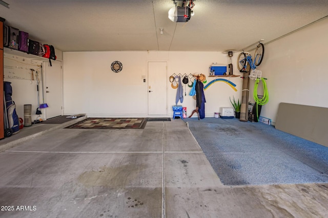 garage featuring a garage door opener