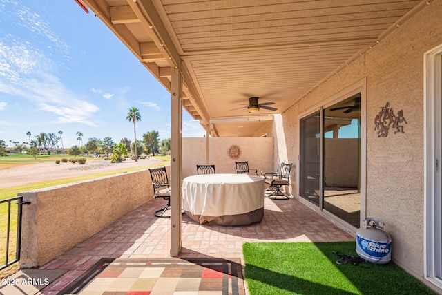 view of patio with a ceiling fan