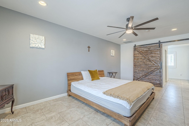bedroom featuring visible vents, a barn door, a ceiling fan, and recessed lighting