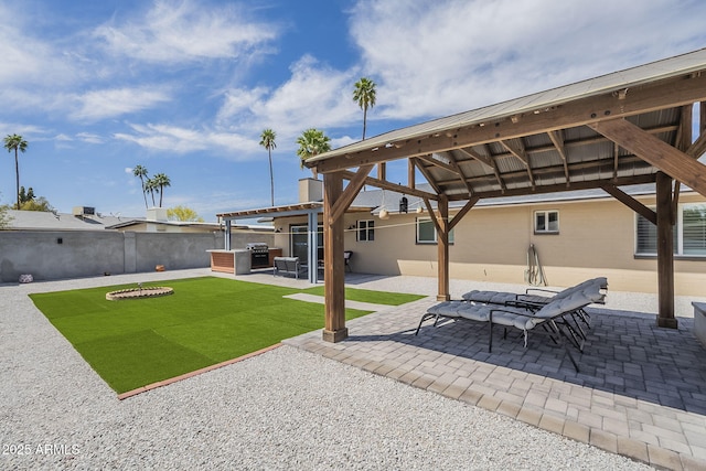 view of patio / terrace with a gazebo and fence