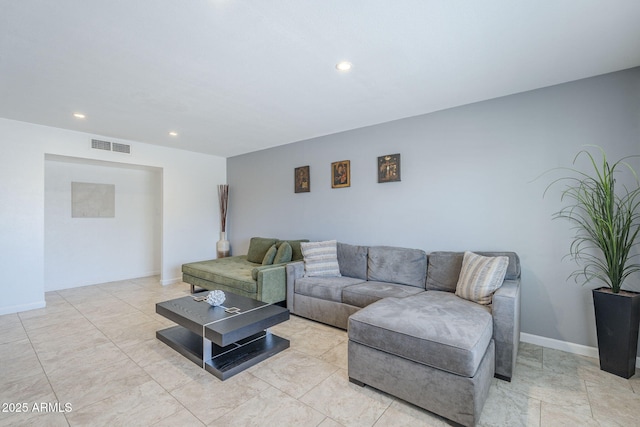 living room featuring recessed lighting and visible vents