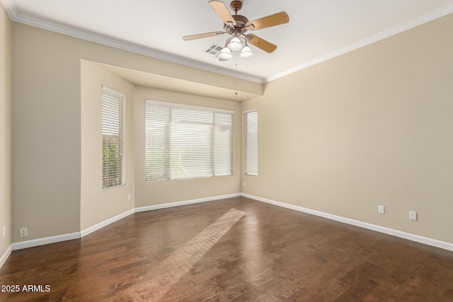 empty room with visible vents, baseboards, a ceiling fan, dark wood-type flooring, and crown molding