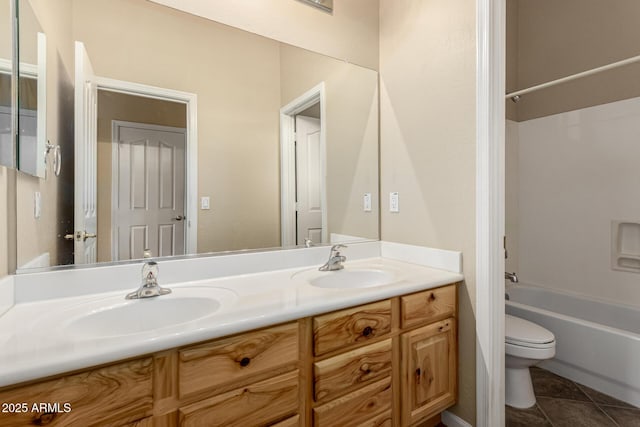 full bath with double vanity, shower / bath combination, a sink, and toilet