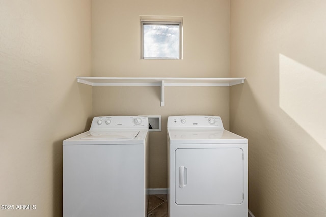 laundry area featuring laundry area and washing machine and dryer