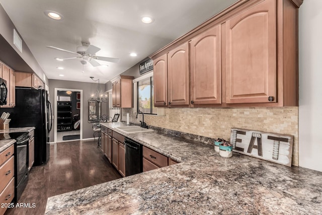 kitchen with sink, dark hardwood / wood-style flooring, decorative backsplash, ceiling fan, and black appliances