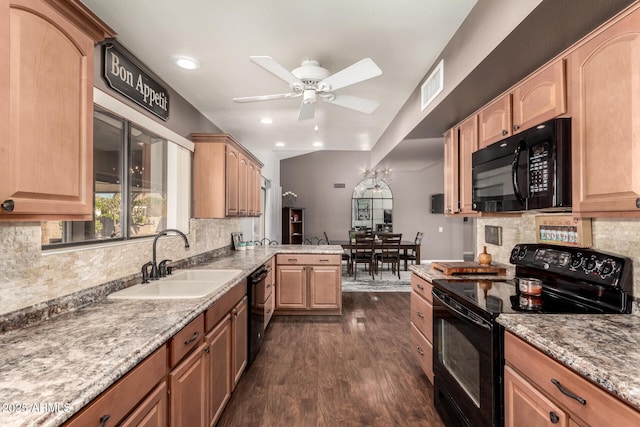 kitchen with sink, backsplash, black appliances, and dark hardwood / wood-style floors