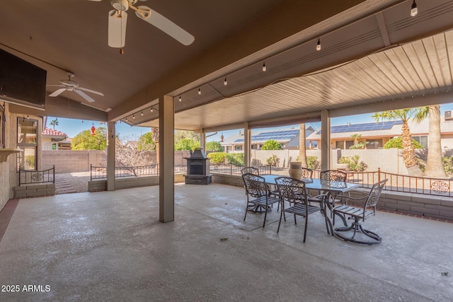 view of patio / terrace featuring ceiling fan