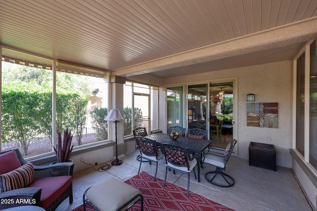 sunroom with wooden ceiling