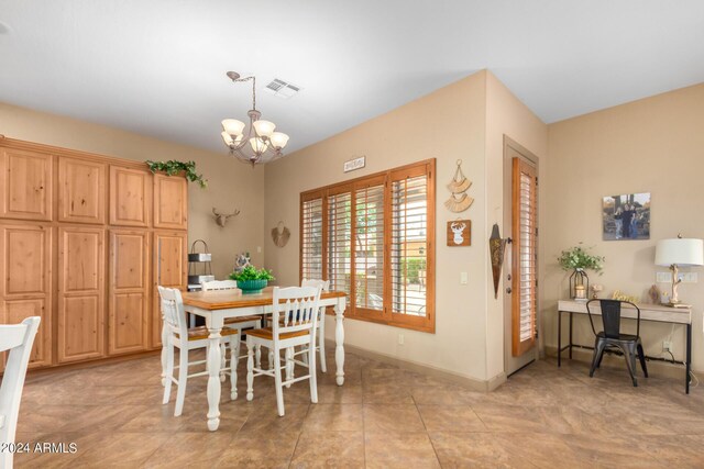 kitchen with pendant lighting, a large island, and appliances with stainless steel finishes