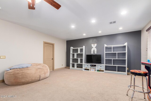 game room featuring light carpet, ceiling fan, and billiards