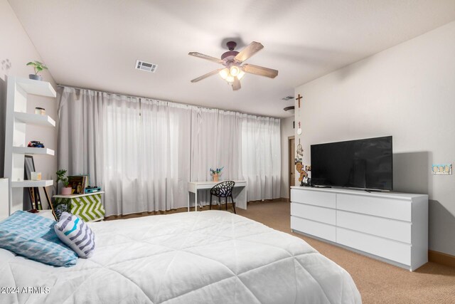 carpeted bedroom featuring ceiling fan