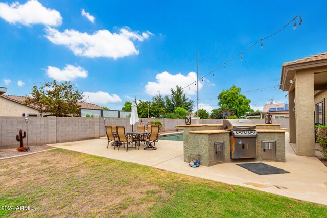 back of house featuring cooling unit and a patio