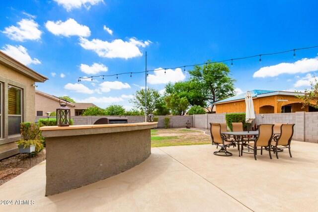 view of patio with area for grilling