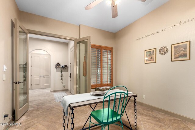 home office featuring ceiling fan and light tile patterned flooring