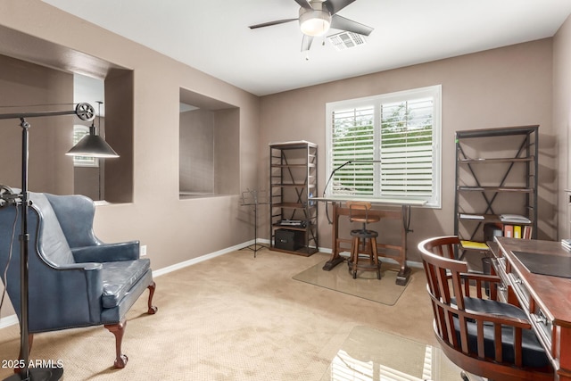 sitting room with a ceiling fan, carpet flooring, and baseboards
