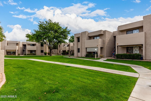 view of community with a lawn