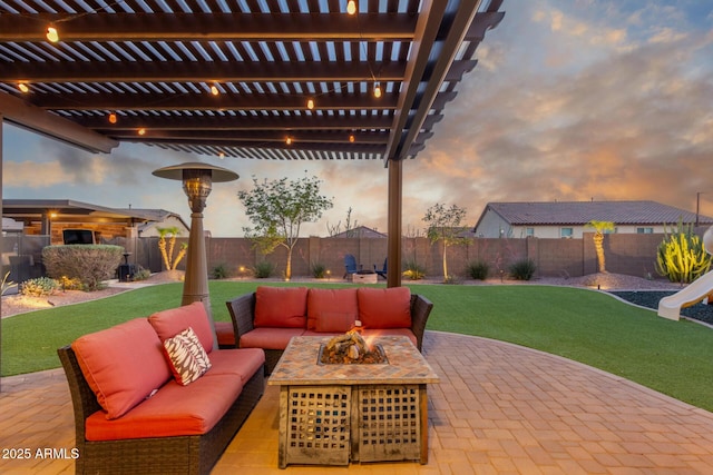view of patio / terrace featuring an outdoor living space with a fire pit and a pergola