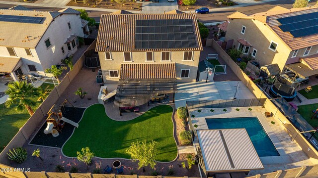 aerial view of residential area featuring a pool