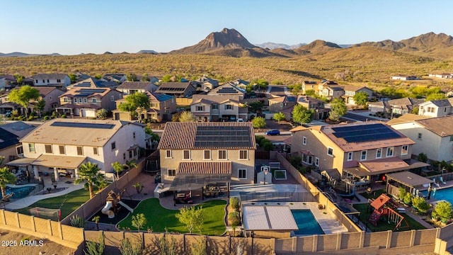 aerial perspective of suburban area with mountains