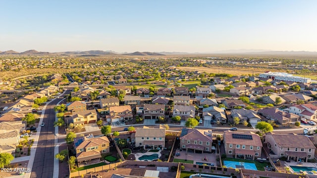 aerial view of residential area with a mountain backdrop