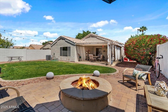 1703 E Palo Blanco Way, Gilbert, AZ 85296 - view of patio featuring an outdoor fire pit and central AC