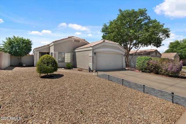 1703 E Palo Blanco Way, Gilbert, AZ 85296 - view of front of home with stucco siding, a garage, concrete driveway, and a tiled roof