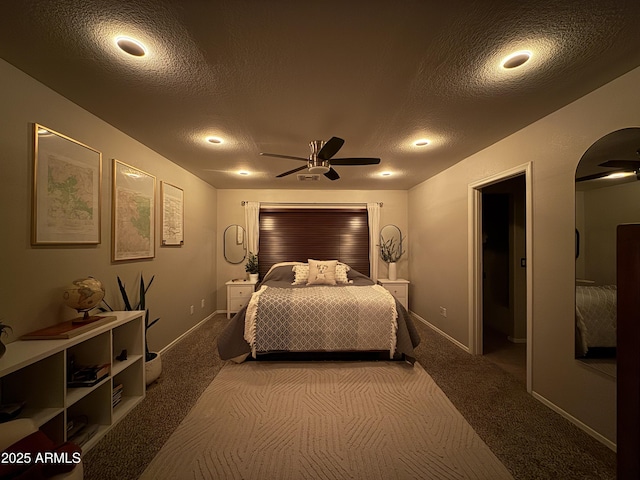 1703 E Palo Blanco Way, Gilbert, AZ 85296 - bedroom with carpet floors, a textured ceiling, arched walkways, and baseboards