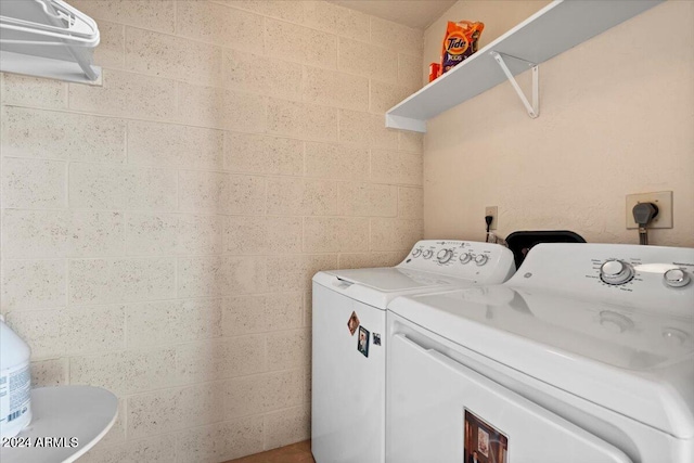 laundry room featuring washer and dryer