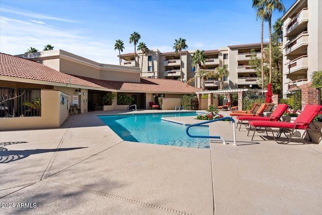 view of pool featuring a patio