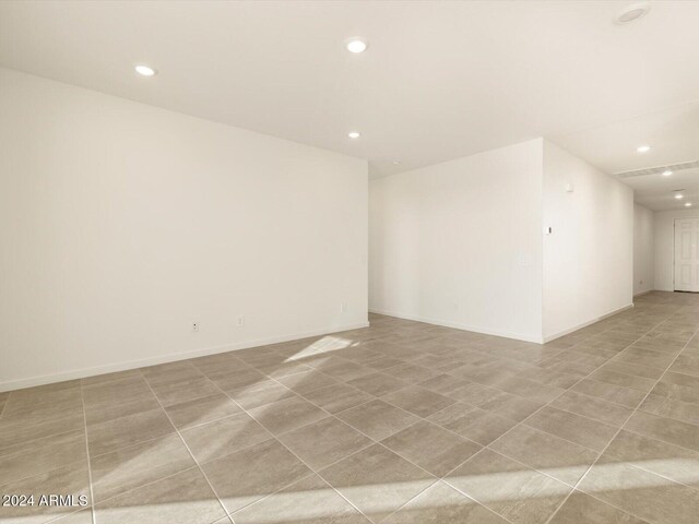 empty room featuring light tile patterned flooring