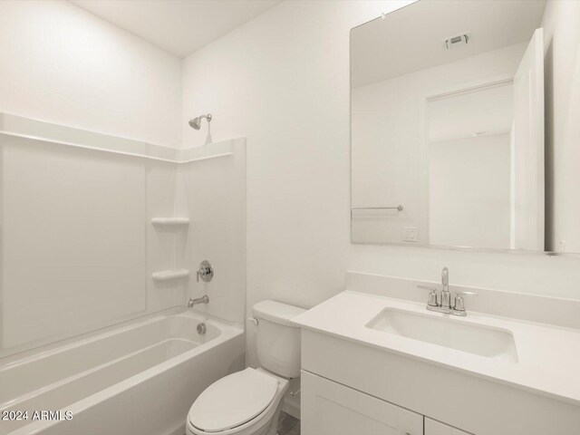 full bathroom with shower / tub combination, vanity, and toilet