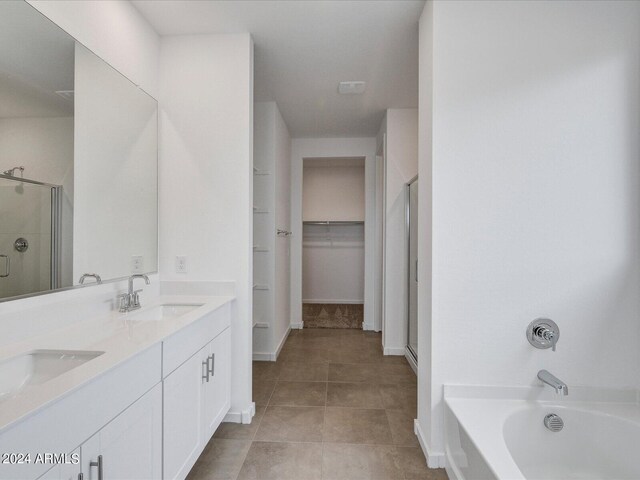 bathroom with vanity, separate shower and tub, and tile patterned floors