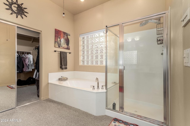 bathroom with independent shower and bath