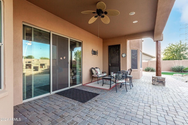 view of patio / terrace with ceiling fan