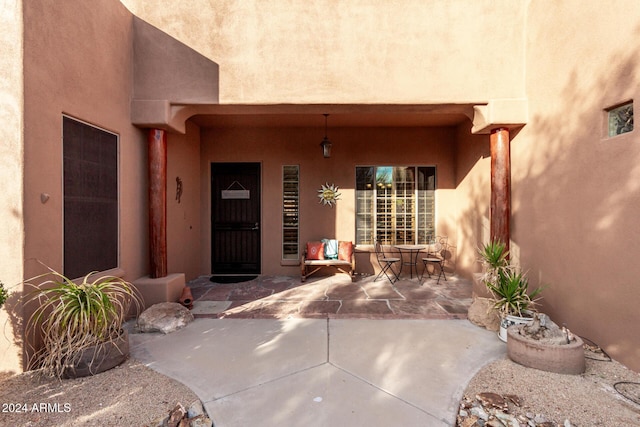 doorway to property featuring a patio