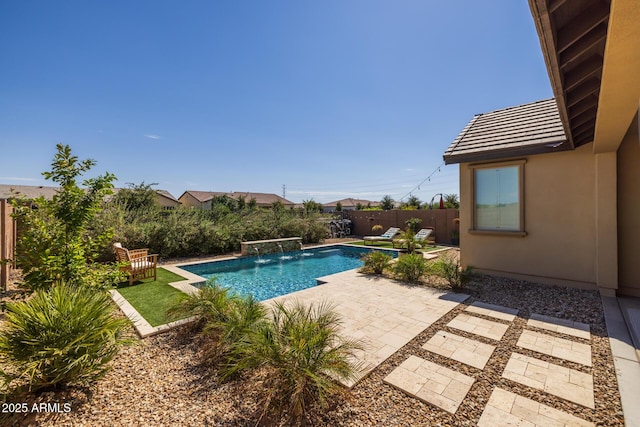 view of pool featuring pool water feature and a patio area