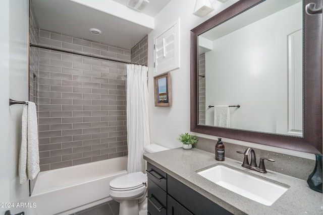 full bathroom with vanity, toilet, and shower / bath combo