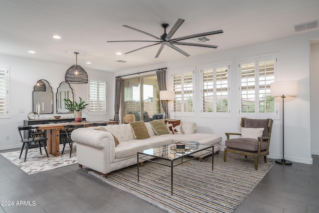 living room featuring ceiling fan