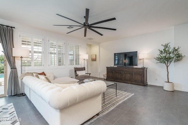 living room featuring ceiling fan